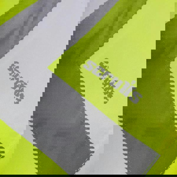 Scruffs High Visibility Mens Hi-Viz Waterproof Zip Up Jacket Coat, close-up showing the bright yellow fabric with reflective gray strips and the brand logo.