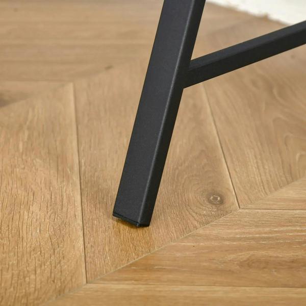 Black desk leg base close-up with sturdy metal frame