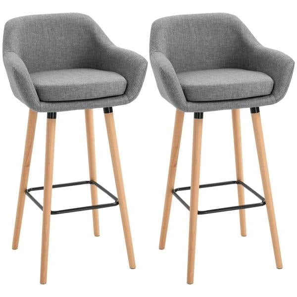 Set of 2 grey upholstered bar stools with black footrest and light wood legs