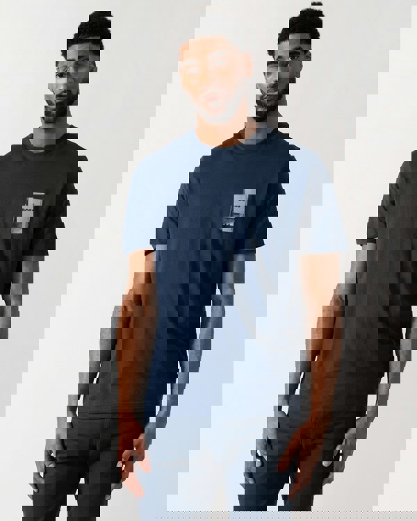 Model wearing a BOSS Orange TePlain Mens T-Shirt in Open Blue