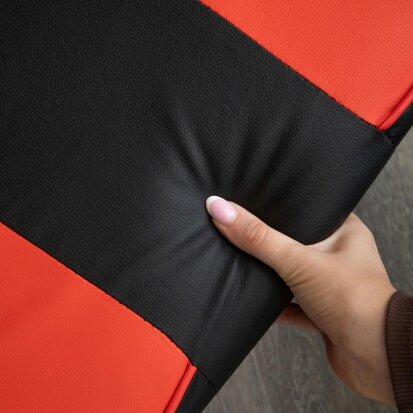 Samuel Alexander Ergonomic Gaming Chair with Footrest and Removable Pillows in Red