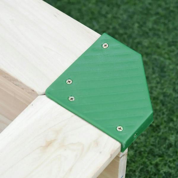 Kids wooden sand pit bench corner with green protective cover secured by screws