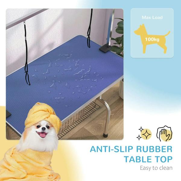 Close-up of blue non-slip rubber top on a pet grooming table with storage basket below