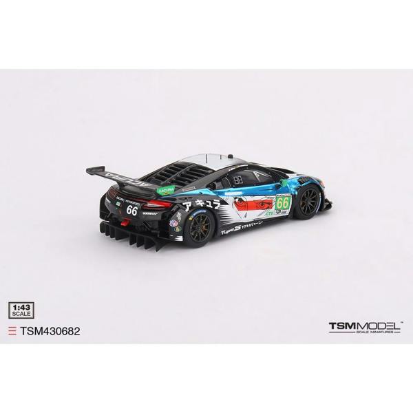 a toy car with a white background