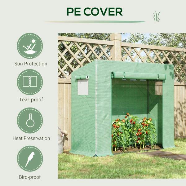 Green greenhouse cover with roll-up door opening and two window panels on steel frame