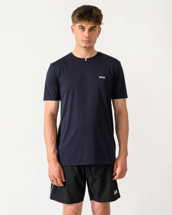 model wearing a BOSS Green TOC Game Mens T-Shirt in Dark Blue 402