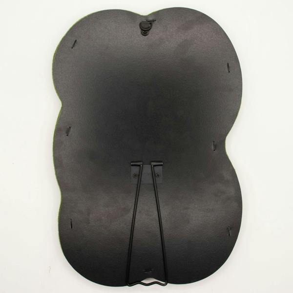 Back of cloud-shaped squiggly mirror, dark fabric backing with hanging tabs