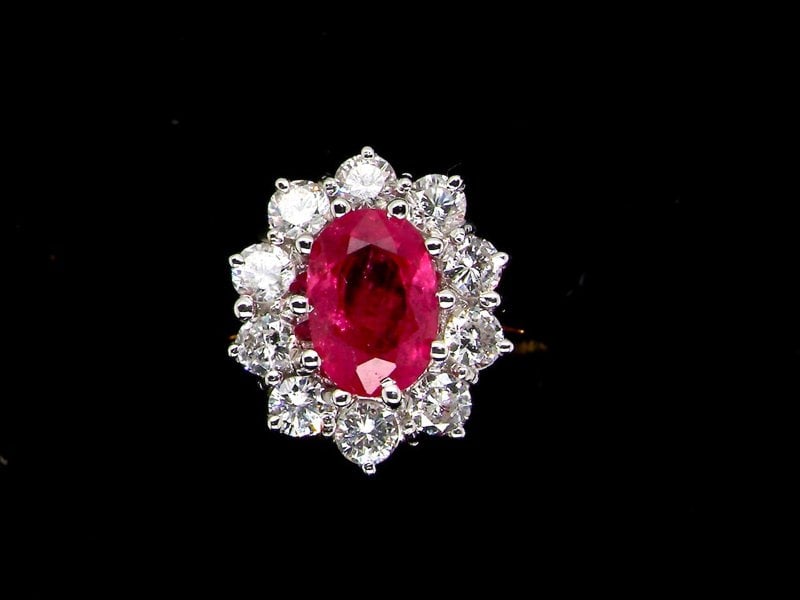 Vintage Tom A fine ruby and diamond cluster ring