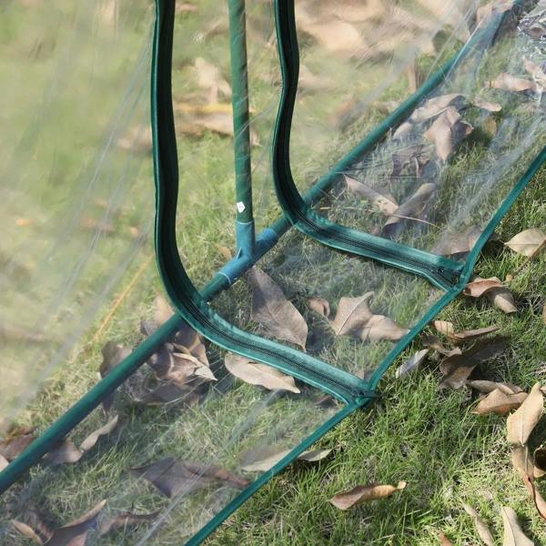 Clear PVC tunnel greenhouse base with green steel support tubes and transparent side cover