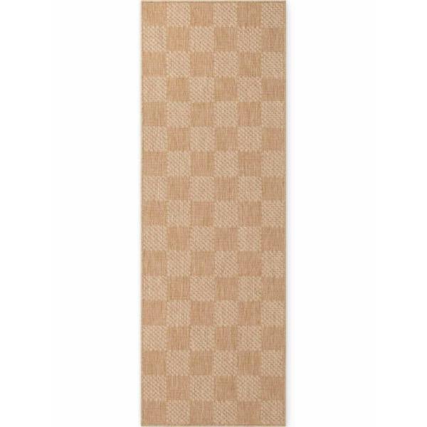 Beige checkered patterned rug on a white background