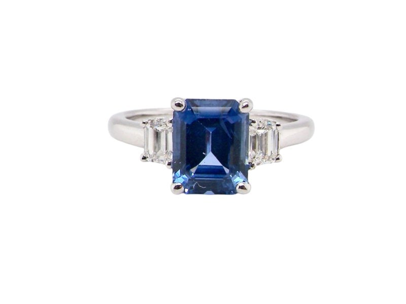 A fine three stone Sapphire and Diamond Ring