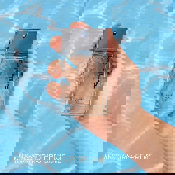 Sapil Solid 100ml EDT Mens bottle held above water surface