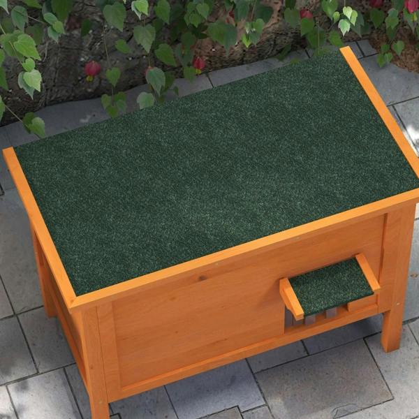 Orange wooden cat house top with dark green felt cushion and side ramp