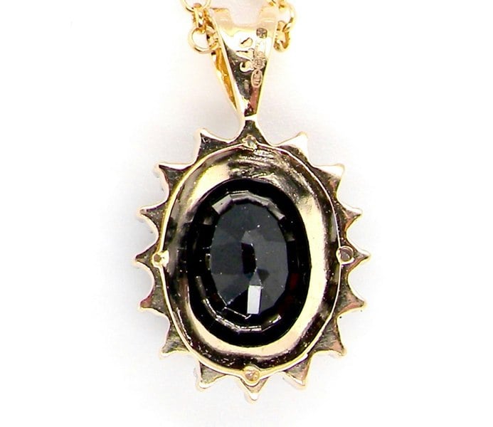 Vintage Tom A 9 carat gold sapphire and diamond pendant