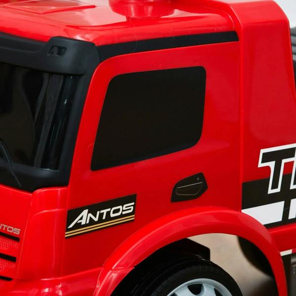 Red ride-on truck side panel with black window and Antos badge