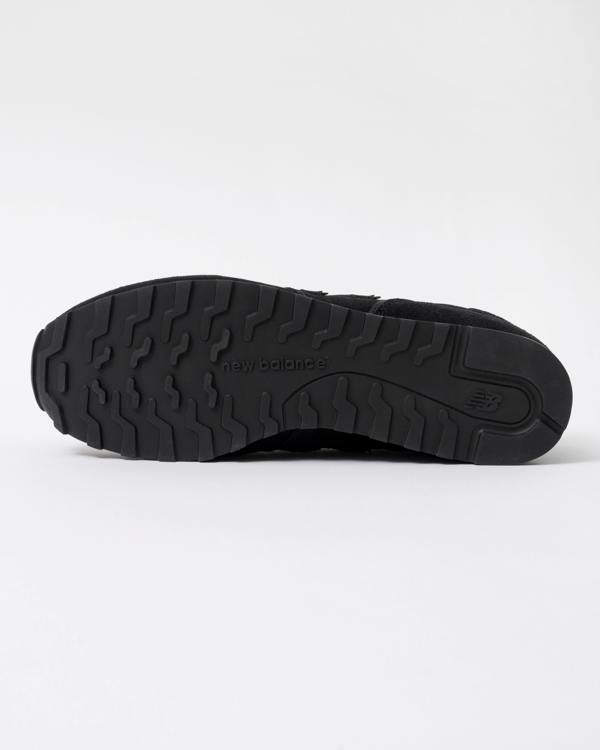 sole of New Balance 373 Mens Trainers in Black
