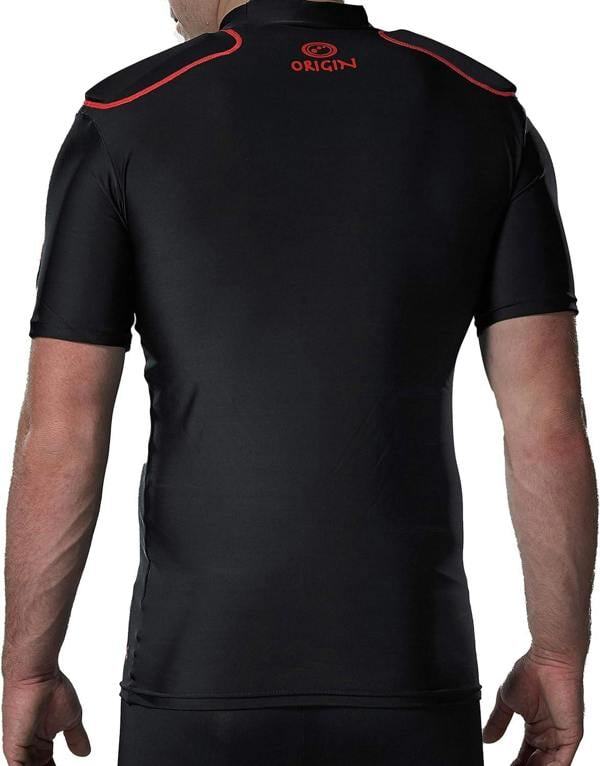 Man wearing black Optimum Origin rugby protective top, back view with red Origin print - Optimum