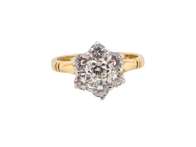 A fine traditional diamond cluster ring