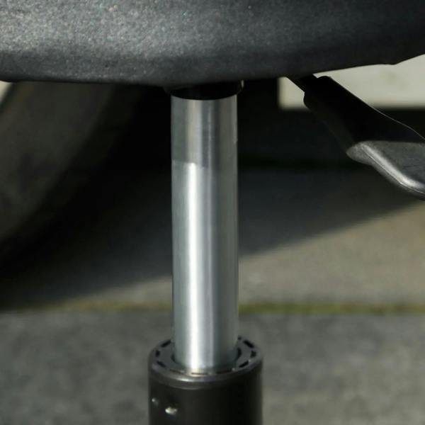 Metal piston seat post and black base housing of an adjustable mechanic stool