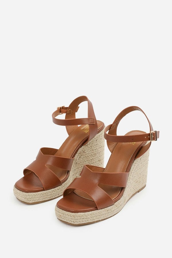 Where's That From Sansa Wide Fit Cut Out Strap Detail Wedge Shoes With Buckle Closure in Tan Grain Pu