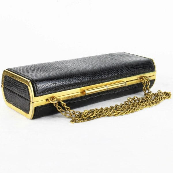 Vintage Gucci purse finished in black lizard leather