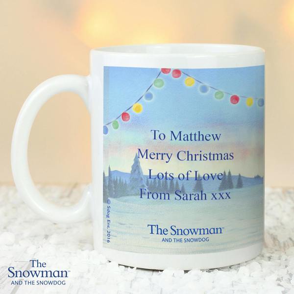 Reverse side of the Personalised Traditional The Snowman and the Snowdog ceramic mug showing a printed custom message reading To Matthew Merry Christmas Lots of Love From Sarah xxx