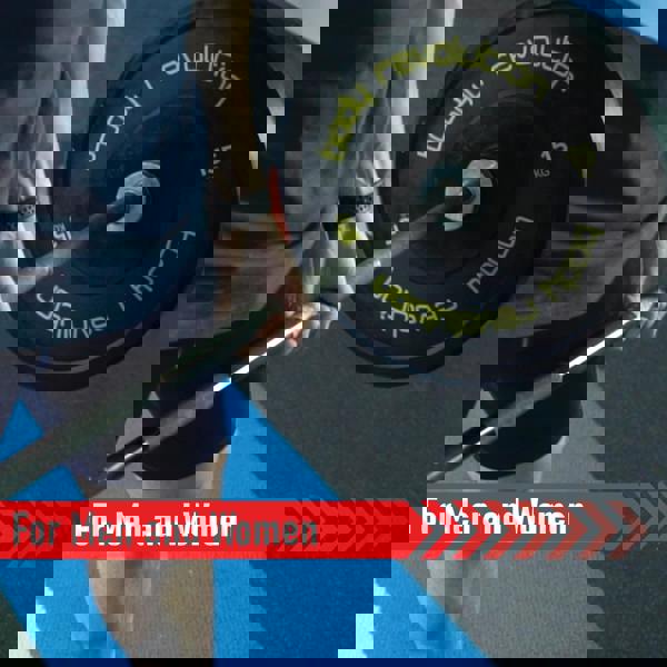 Black Olympic bumper plate with yellow lettering, held by a person, showcasing a weightlifting setup for men and women