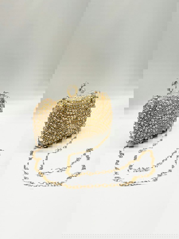 SVNX Oval Pearl Clutch Bag In Gold