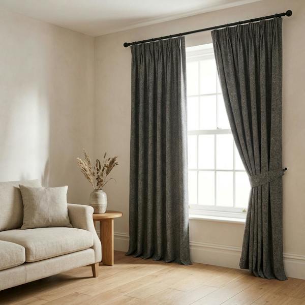 Sevilla made-to-measure curtains in Nero, styled in a living room