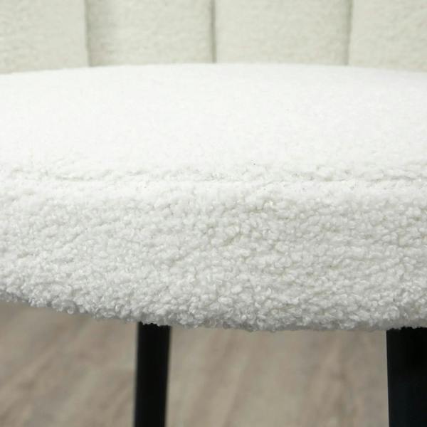 Cream boucle bar stool seat cushion close-up with plush textured fabric