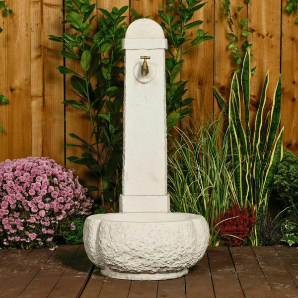 Large White Stone Fountain with carved Base