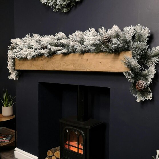 Samuel Alexander 6ft (1.8m) Premier Christmas Snow Flocked Green Garland with Pine Cones