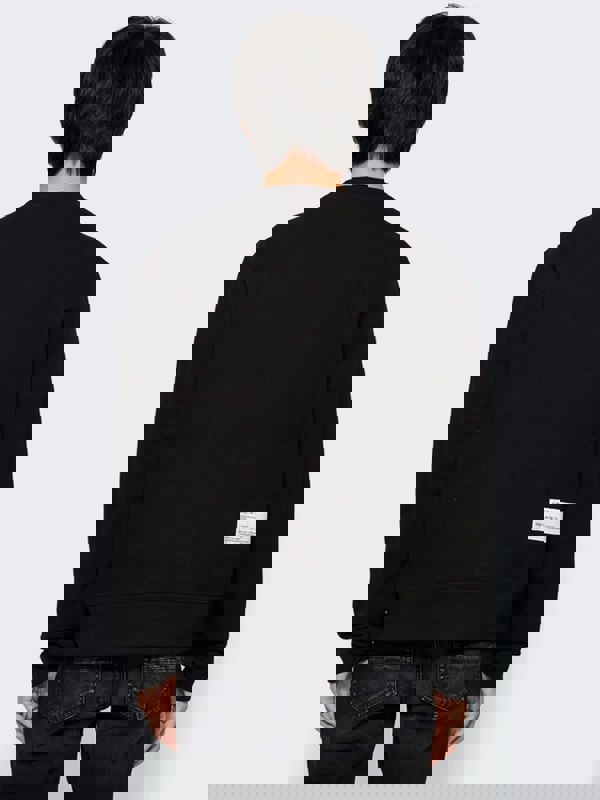 Amiri x Wes Lang Checker Skull Crew Neck Sweater – Black