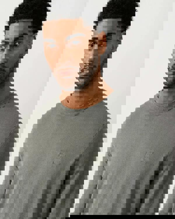 close up shot of a model wearing a BOSS Orange Kanovano Mens Crew Neck Jumper in Open Grey 076