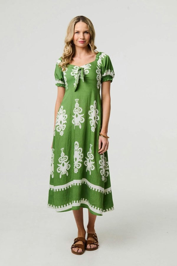 Green | Printed Puff Sleeve Tie Front Midi Dress : Model is 5'10"/178 cm and wears UK10/EU38/US6/AUS10 
