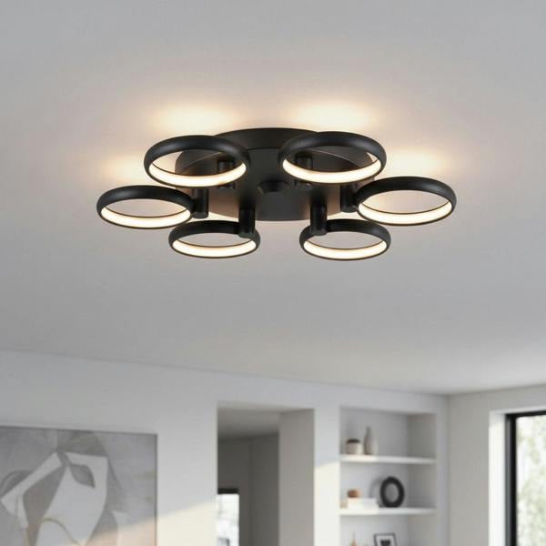 black large flush ceiling light mounted on the ceiling in a large modern room 