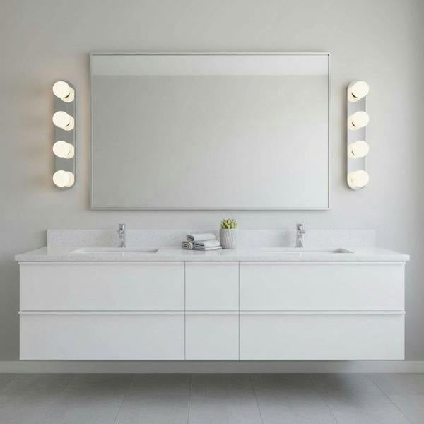 silver vanity light for bathroom mirror mounted either side of a mirror in a modern bathroom
