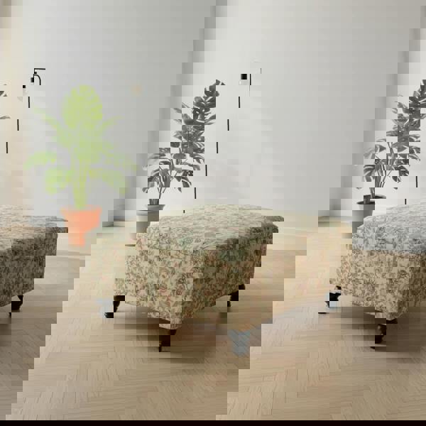 Elegant large ottoman footstool used as coffee table with storage