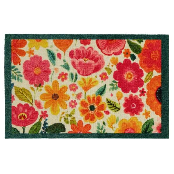 Floral patterned rug with pink, orange, and yellow flowers on a white background