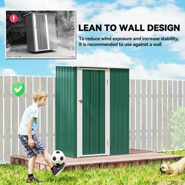 Green metal storage shed with front door, shown on a raised base for stability