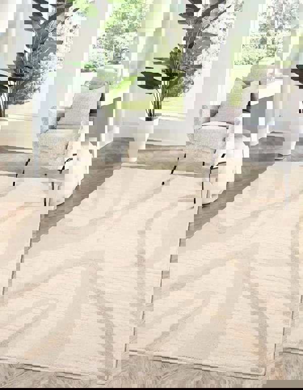 Ava Pave Wave Illusion Rug in cream with abstract design, enhancing modern interior decor.