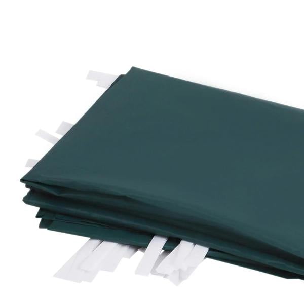 Stack of dark green replacement gazebo side panels in folded fabric
