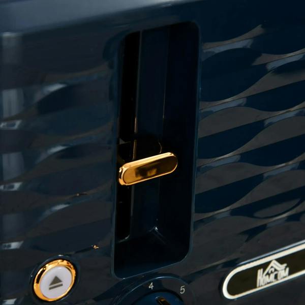 Close-up of blue toaster lever and control dial with gold trim accents