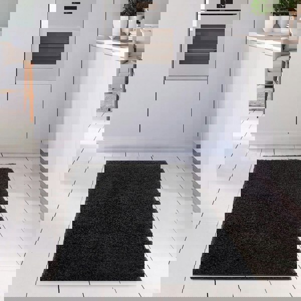 Black shaggy Rug Plain design thick pile, high quality, soft & durable.