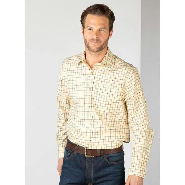 Man wearing the Rydale Gransmoor Mens Country Check Shirt in Lovat with dark jeans.