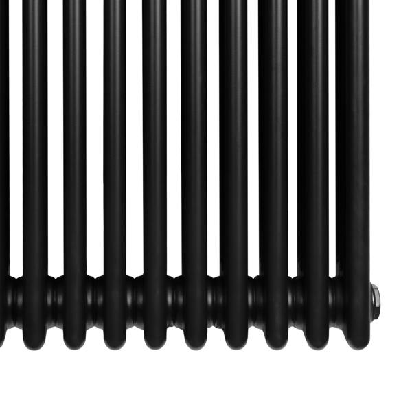 Traditional black 4 column radiator with smooth, glossy finish and rounded edges, measuring 300 x 1010mm, ideal for classic interiors