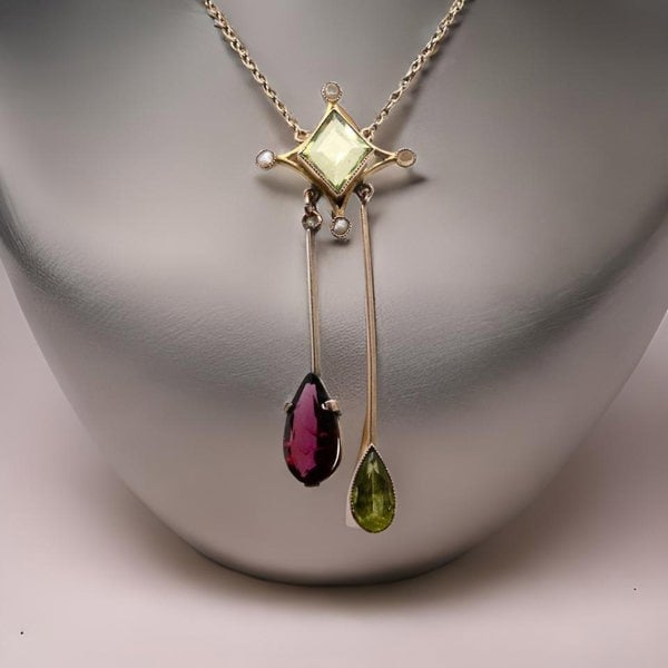 Vintage Tom An antique garnet and peridot pendant