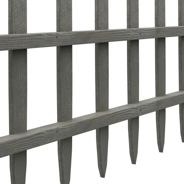 Close-up of grey wooden picket fence panels with smooth top rails and posts