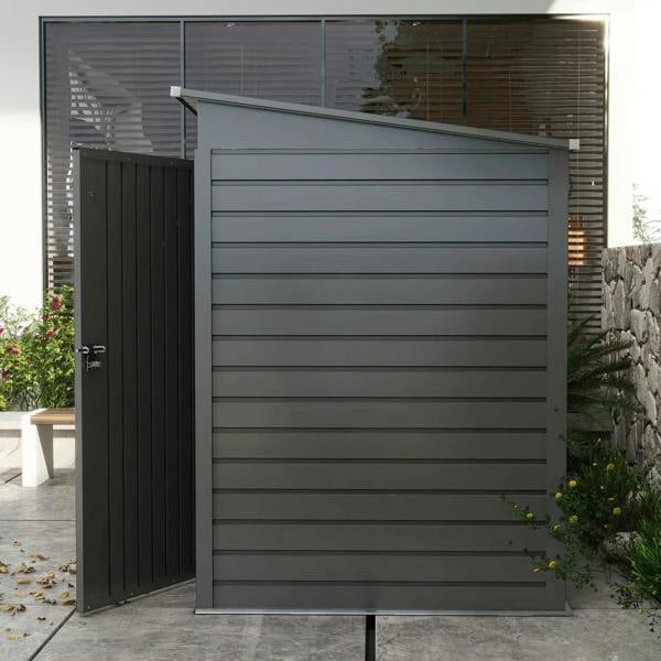 Grey metal garden shed with hinged door and shutter-style wall panels