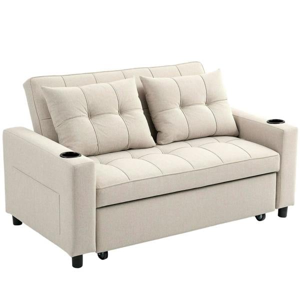 Beige two-seater sofa bed with tufted seat and back cushions, padded arms, cup holders